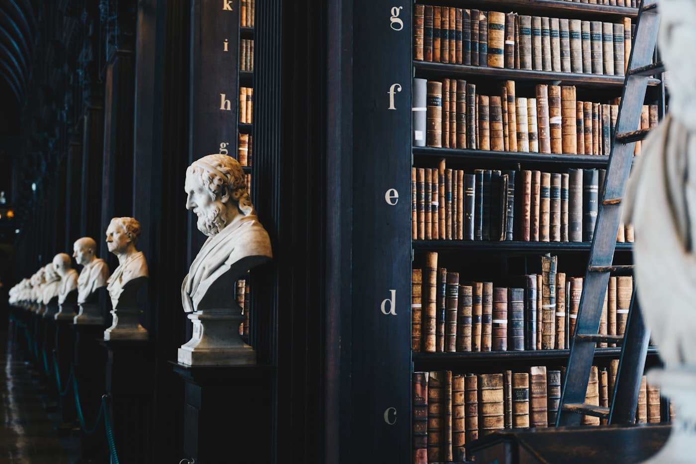 Law library and legal statues representing organized legal consultation